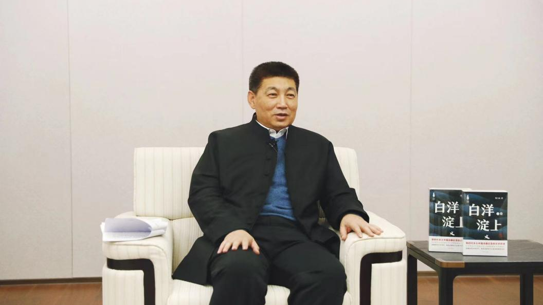 关仁山：在太阳集团1088vip新区的画卷中眺望文学的风景